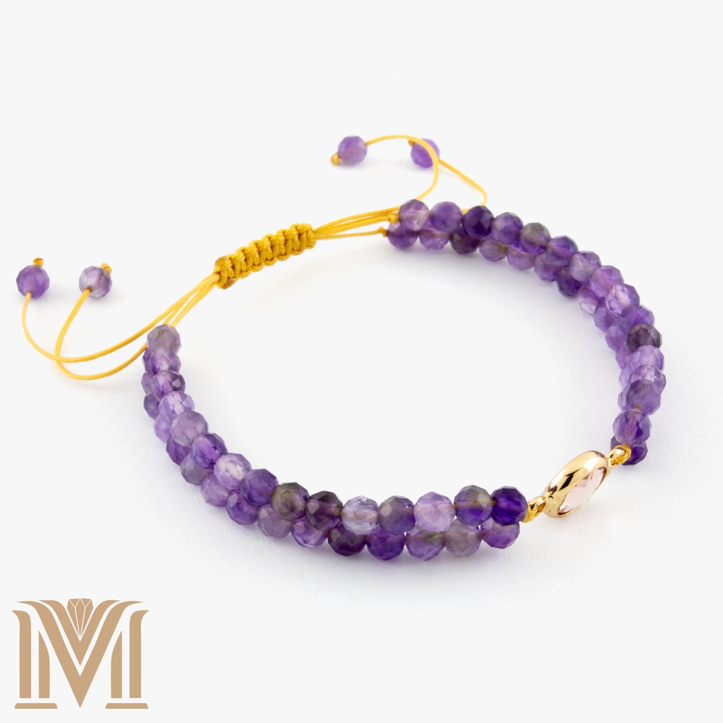 Amethyst beads and gold-tone centerpiece close-up