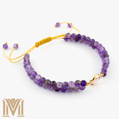 Amethyst beads and gold-tone centerpiece close-up