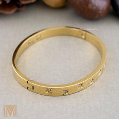 Personalized gold bangle with crystal accents