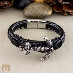 Braided black leather bracelet with silver accents
