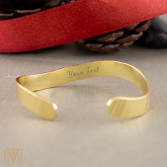Inside engraving on adjustable women's gold cuff