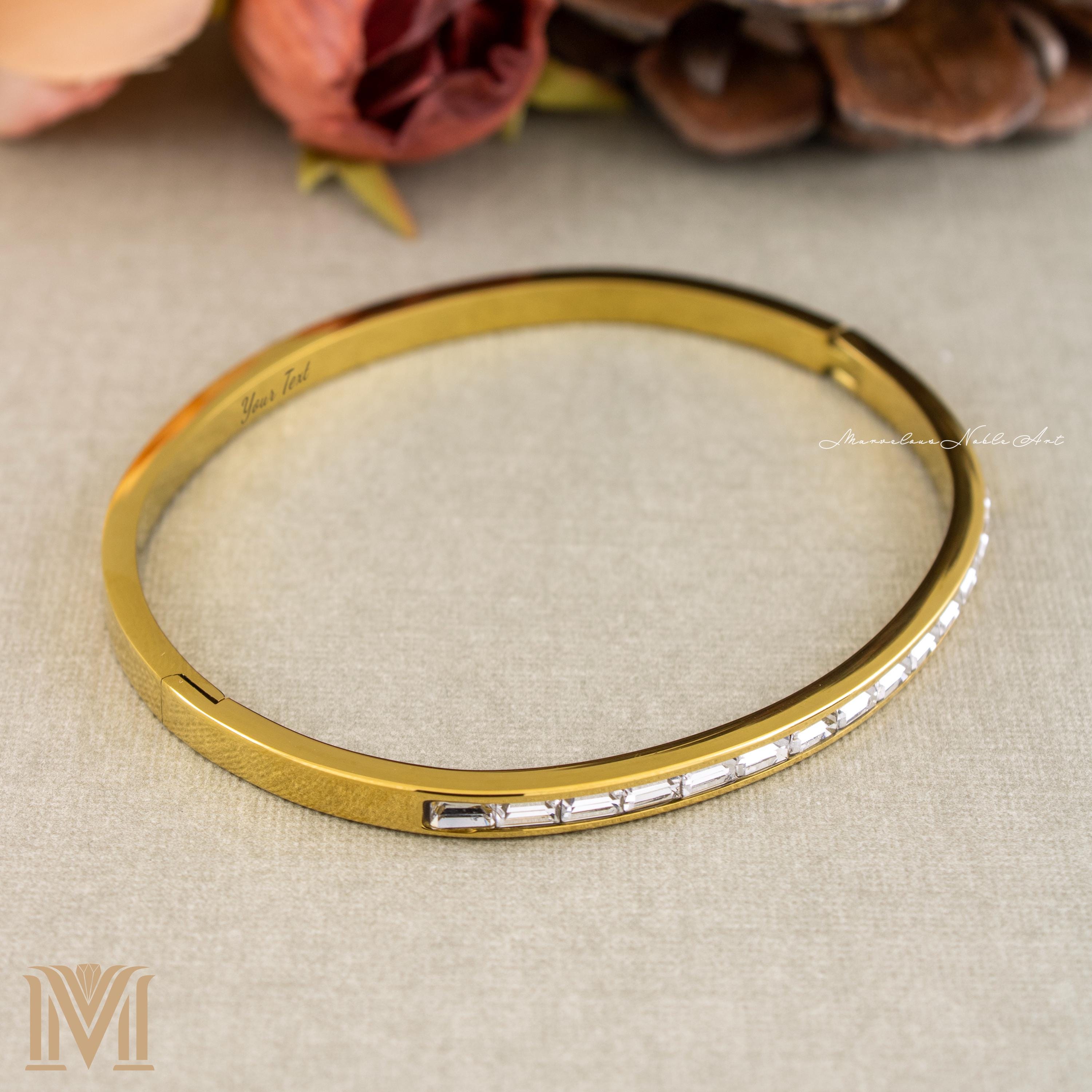Slim gold bracelet with crystal detail