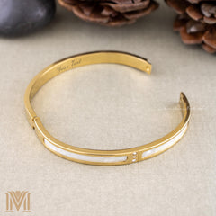 Open gold bracelet view