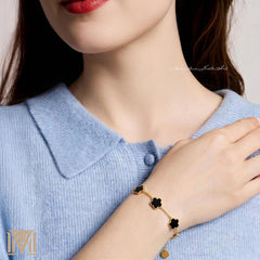 Black clover bracelet on wrist