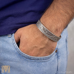 Man wearing Tree of Life cuff