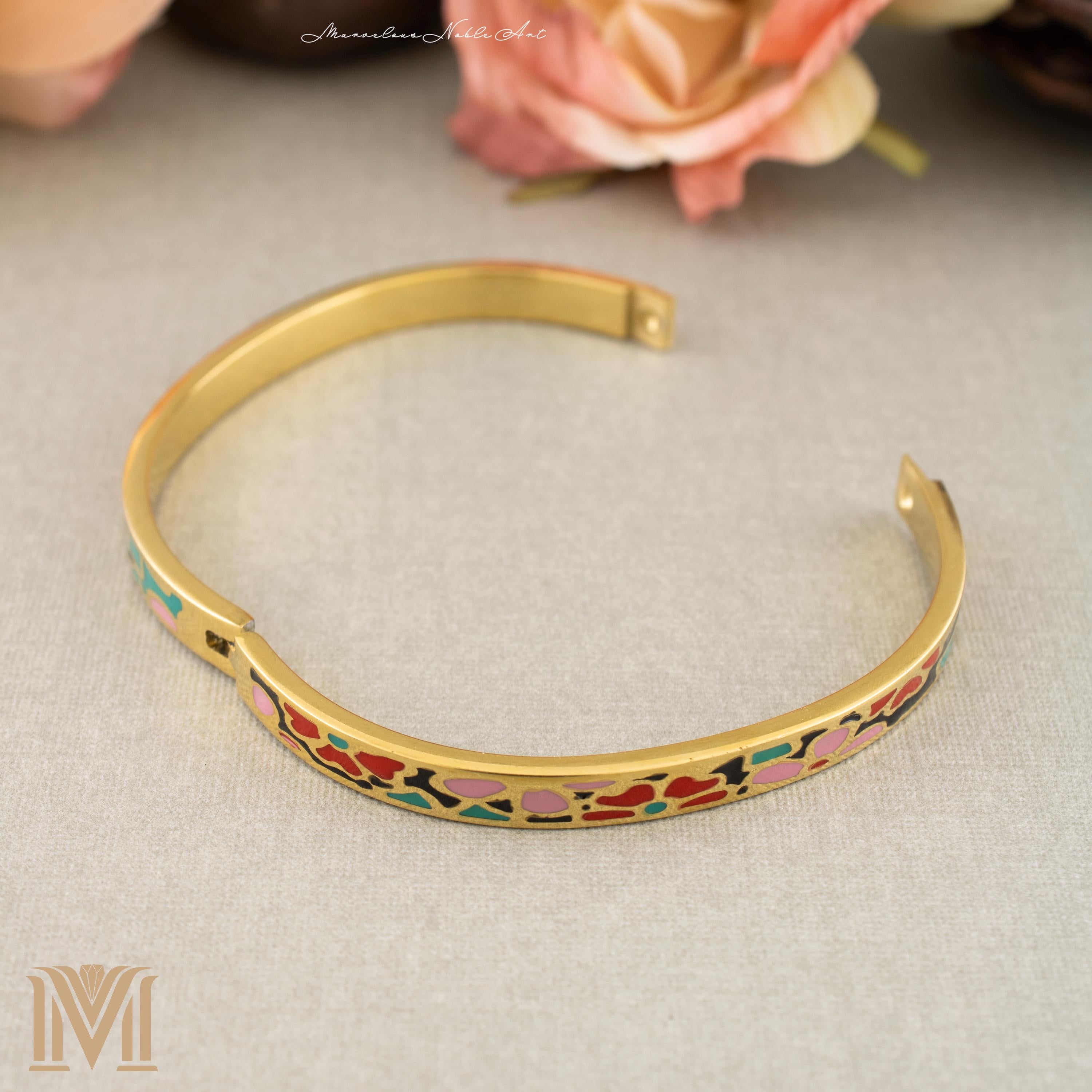Gold and enamel bangle close-up