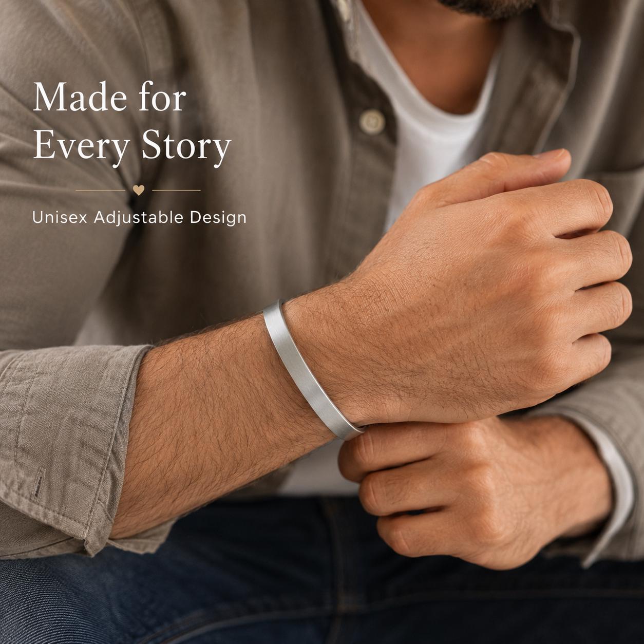 Man wearing minimalist silver open cuff