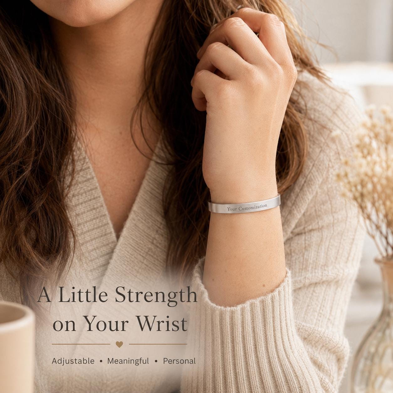 Woman wearing slim silver stainless steel cuff