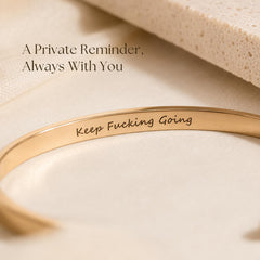 Close-up of hidden inside engraving on gold cuff