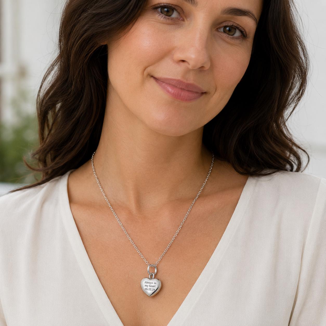 Woman wearing heart urn necklace