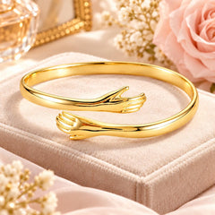 Gold hug bangle gift presentation