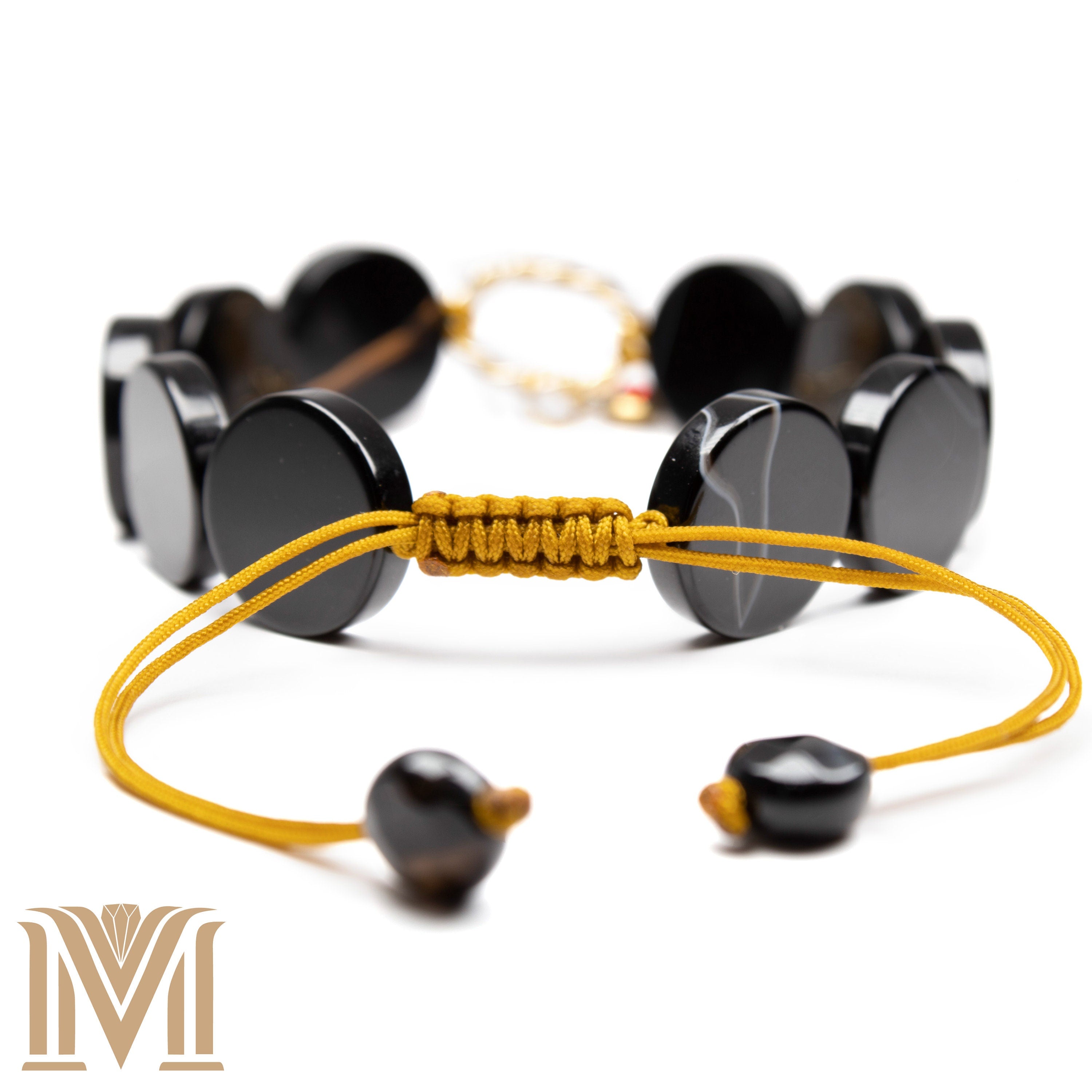 Adjustable Onyx bracelet with gold-plated chain