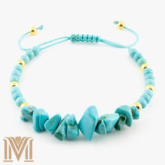 Turquoise chip bracelet with gold spacers and macrame cord