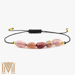 Strawberry Quartz bracelet with black cord and gold accents