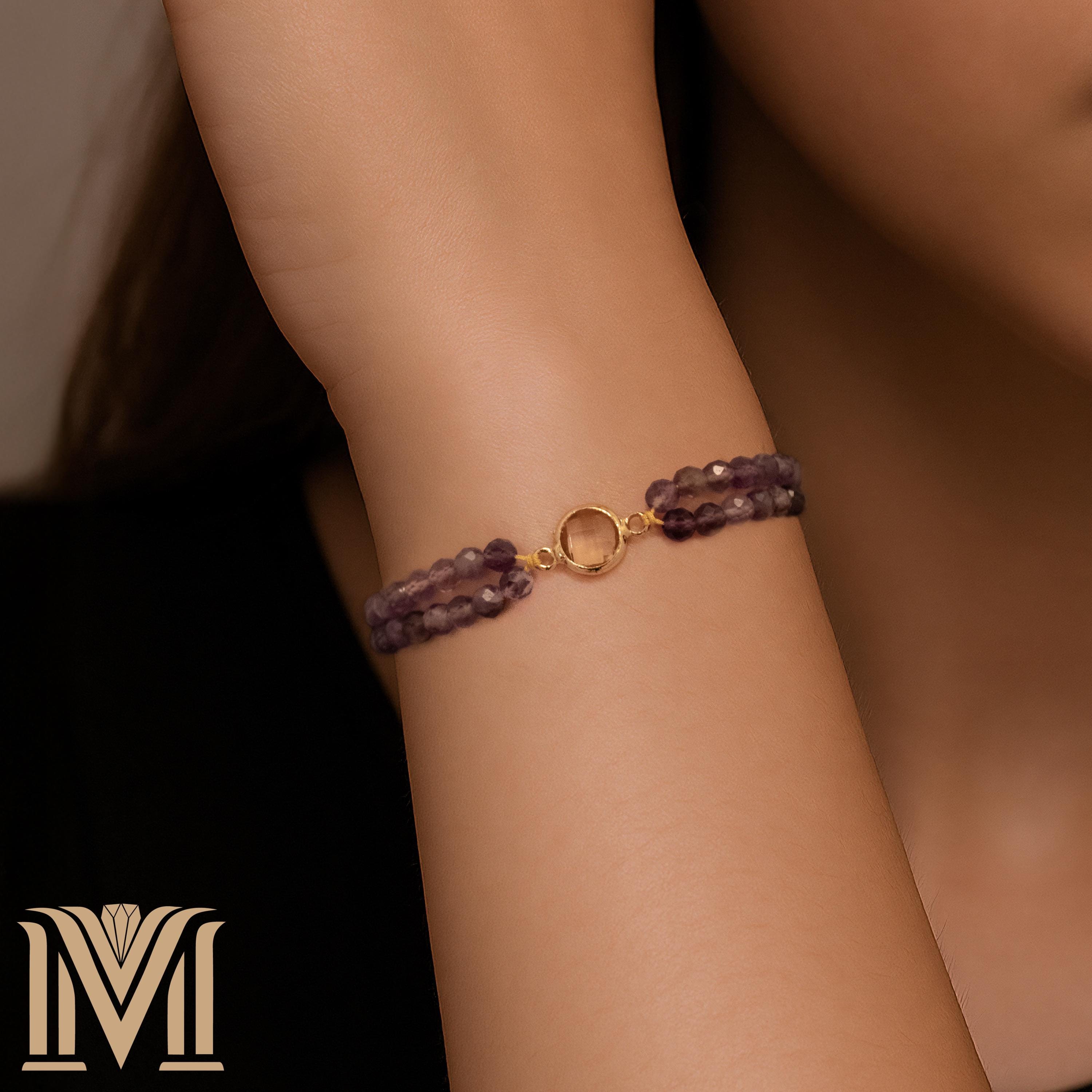Adjustable Amethyst bracelet worn on wrist