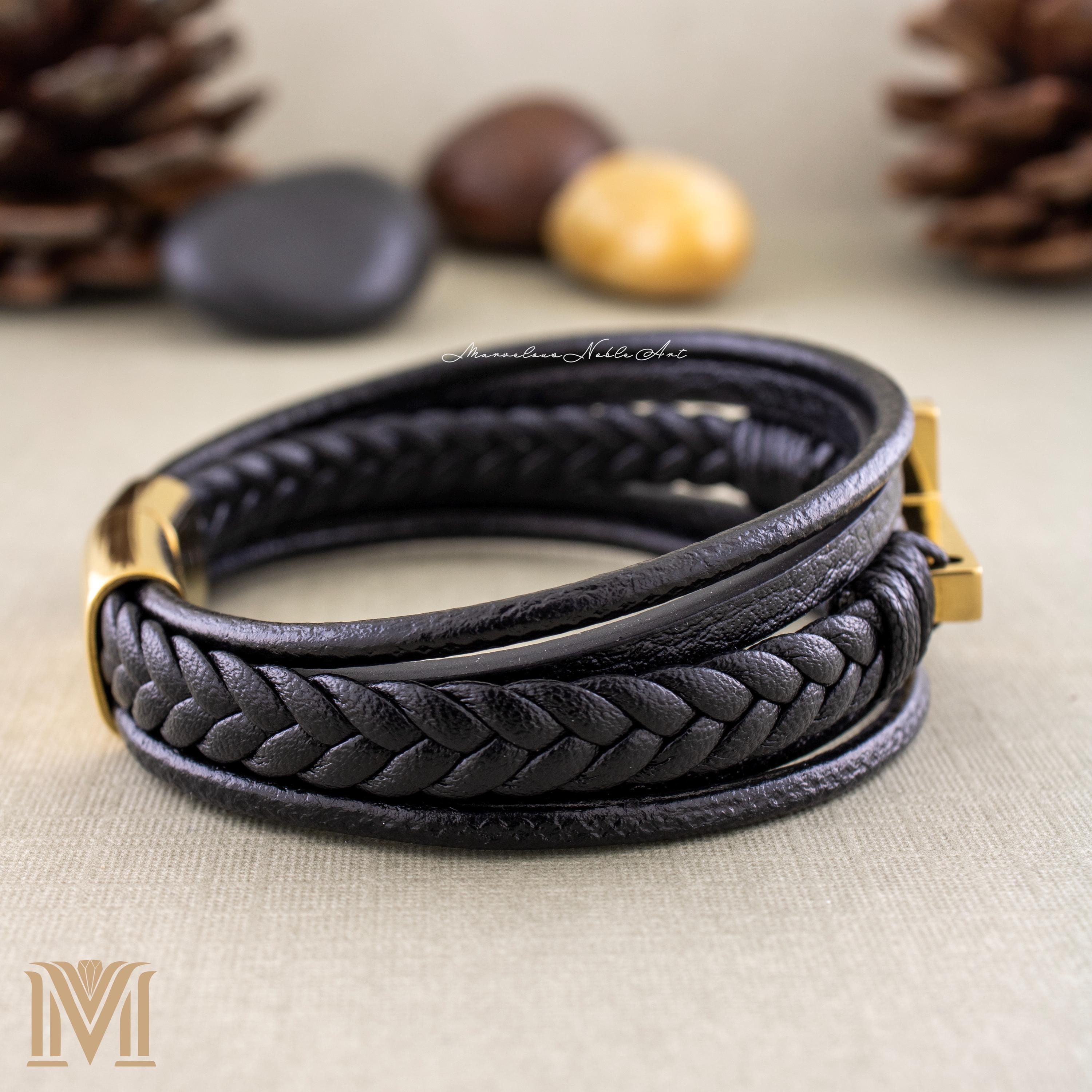 Back view of layered black leather bracelet