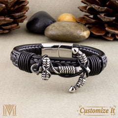 Black braided leather bracelet with silver accents