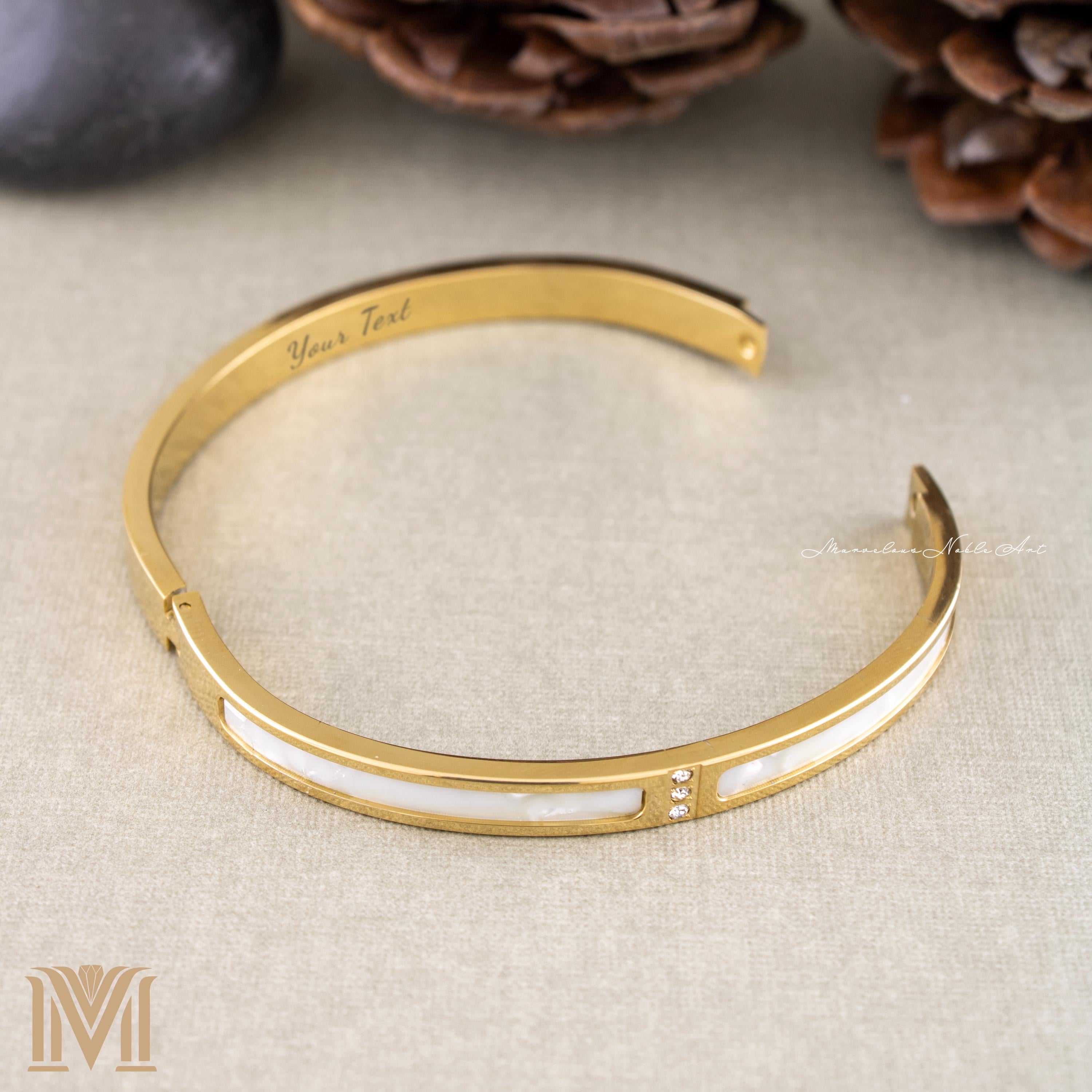 Open gold bracelet view