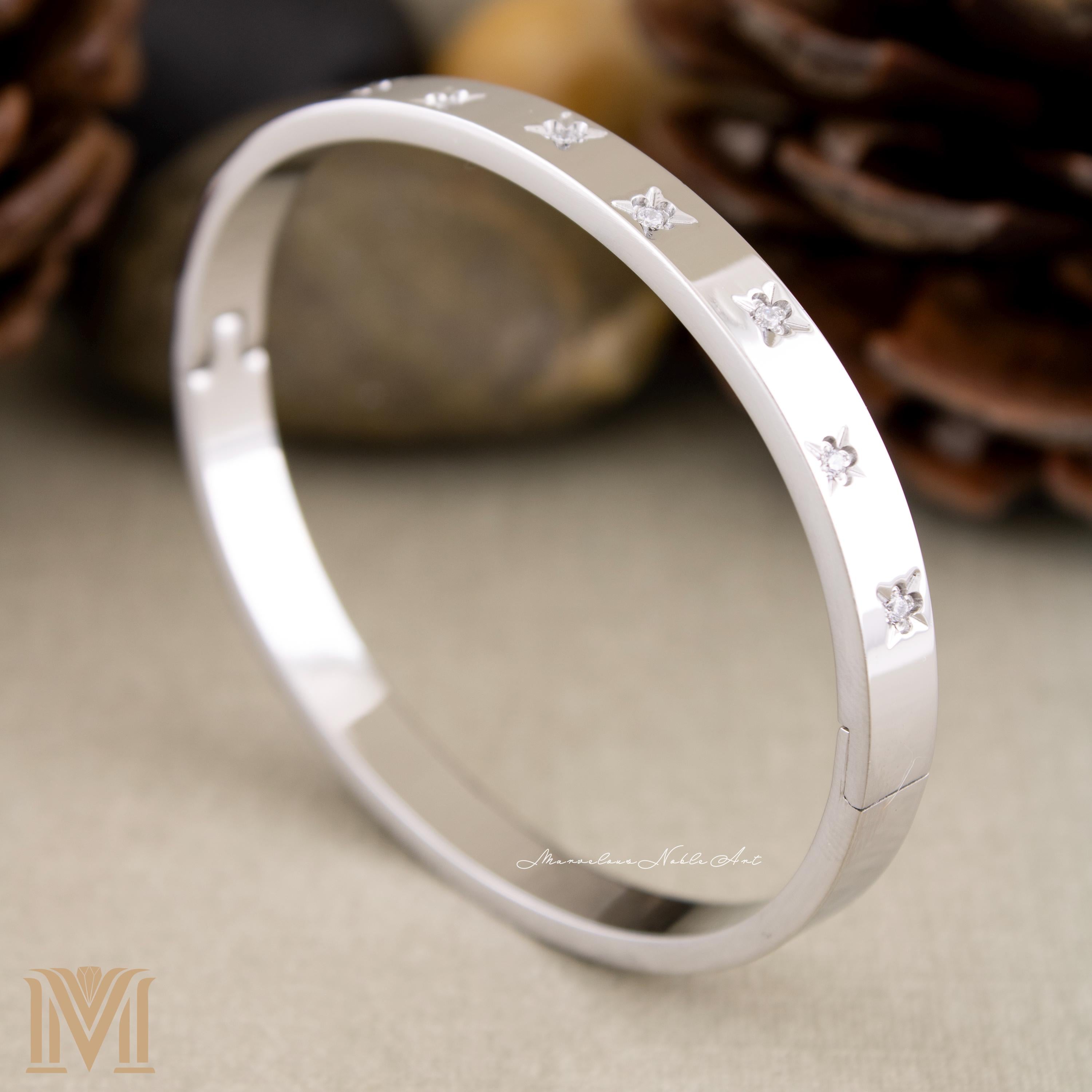 Polished silver bangle angled view