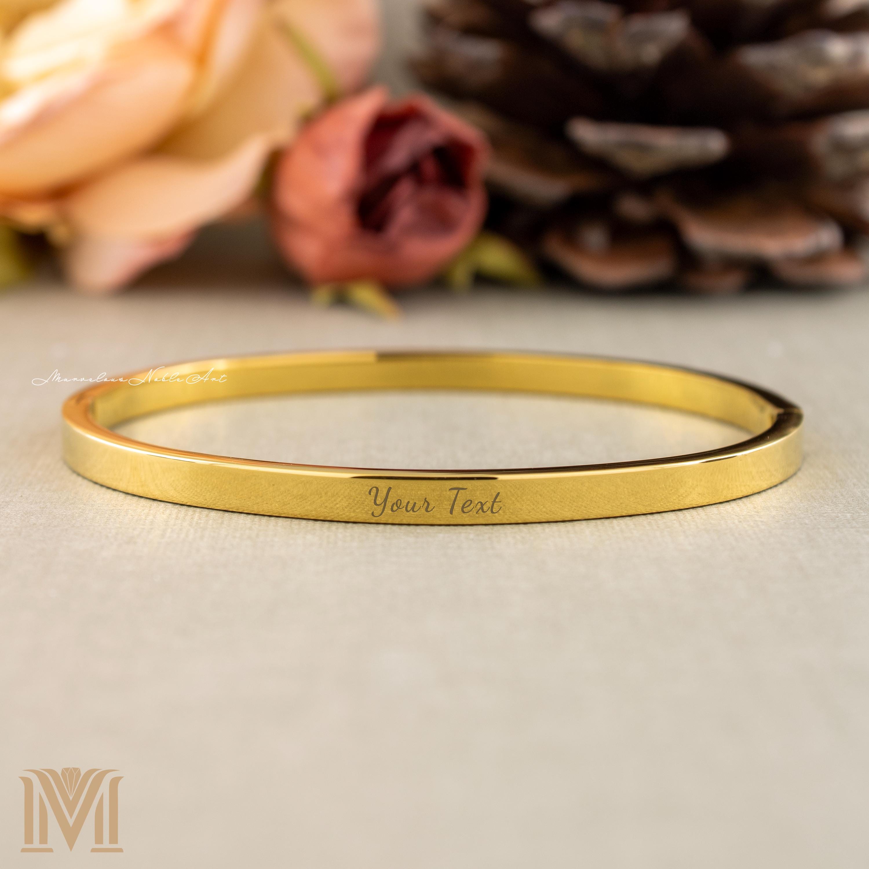 Gold bangle with custom engraving example