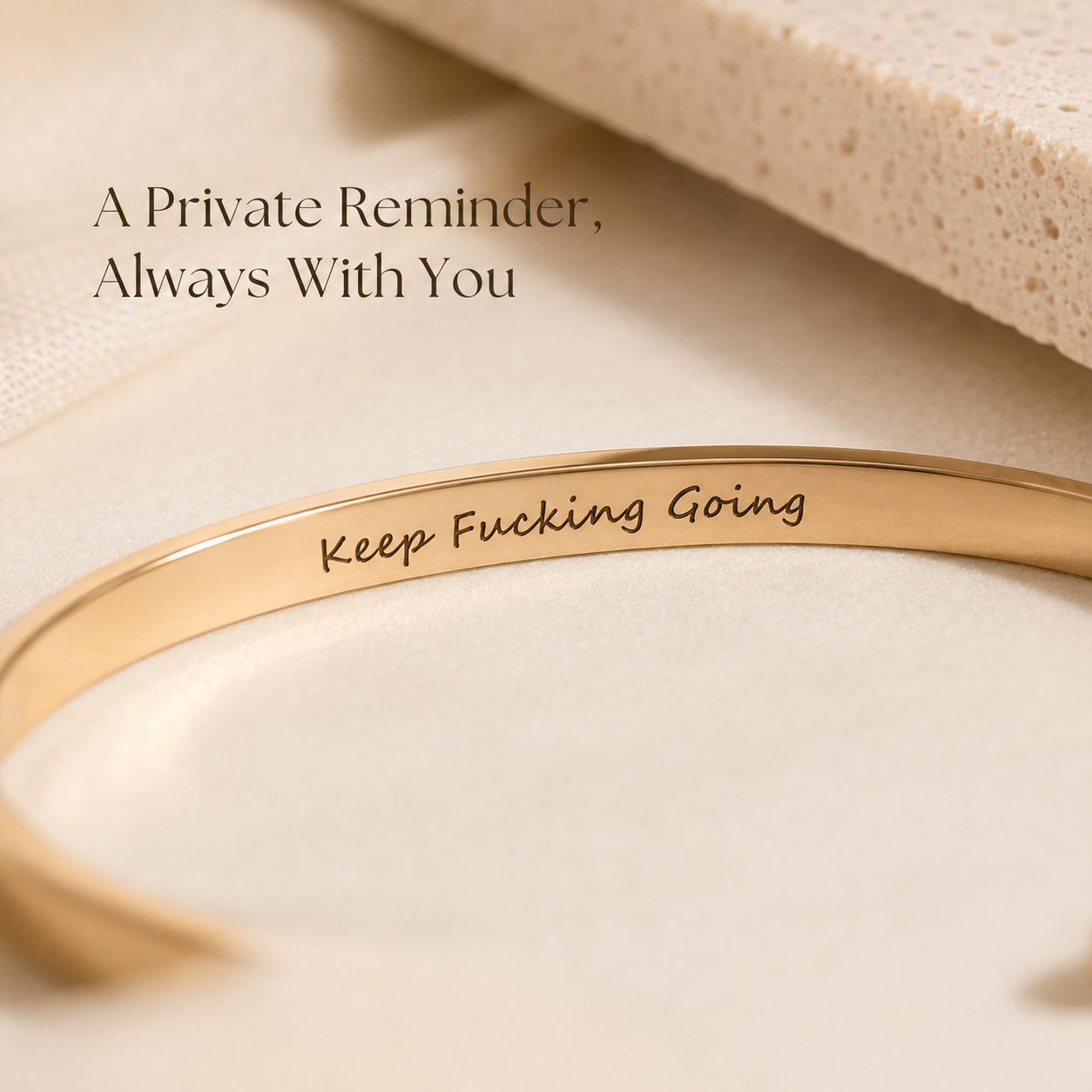 Close-up of hidden inside engraving on gold cuff