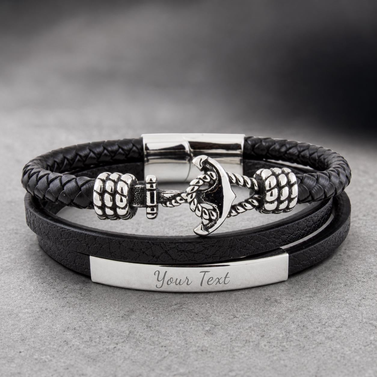 Personalized black leather bracelet with anchor charm and name plate