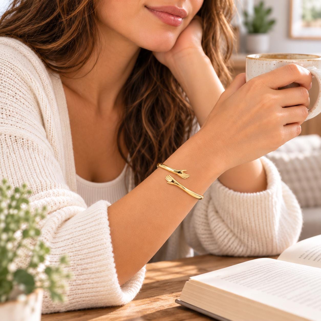 Gold open cuff styled on wrist